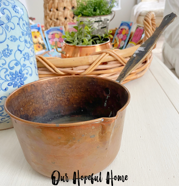 tarnished vintage brass cooking pot