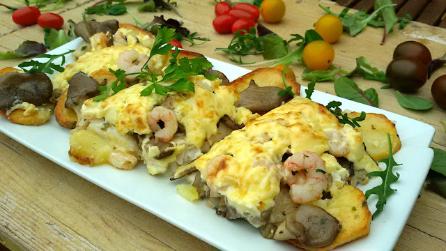 http://www.annarecetasfaciles.com/2015/12/merluza-rellena-de-setas-y-gambas.html 