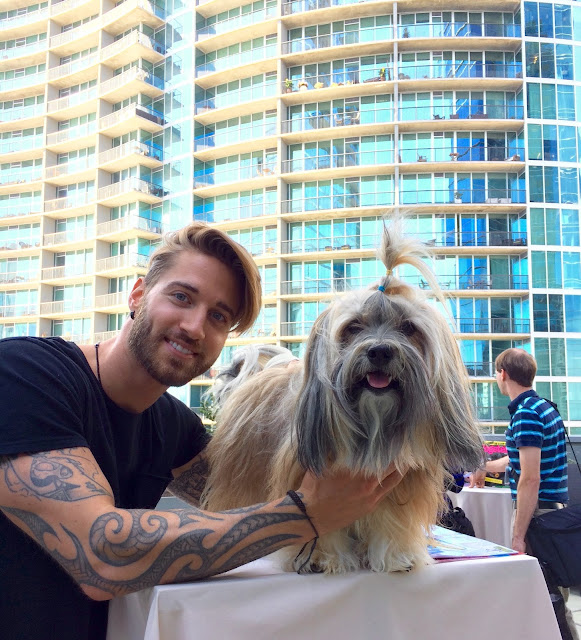 Travis DesLauier Jacob Cat with Rocco Havanese at Barkworld expo 