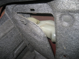 Relocation of windshield washer fluid resveroir to trunk