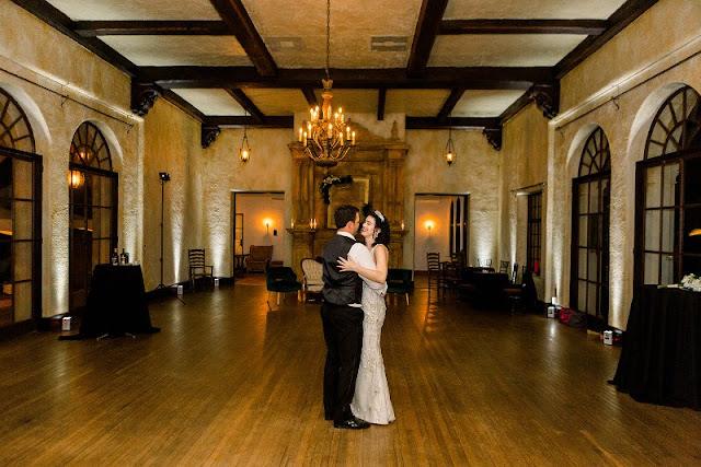 bride and groom dancing on dancefloor