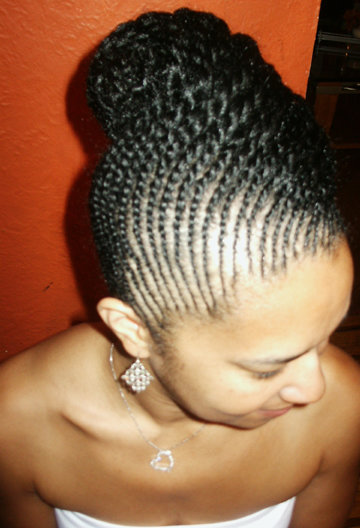 Here's is an elegant natural updo with twists, courtesy of the fabulous 