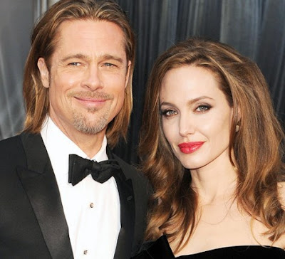 Foto de Brad Pitt y Angelina Jolie sonriendo