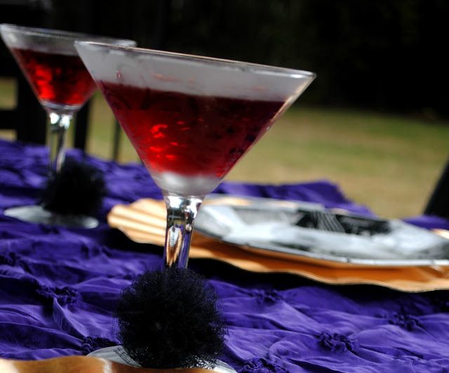 Tulle poms by Fizzy Party add a touch of fun and texture to cocktail glasses 