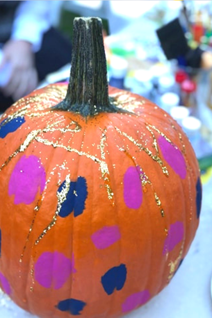 Painted pumpkin at a pumpkin party