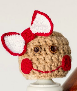 http://translate.google.es/translate?hl=es&sl=en&tl=es&u=http%3A%2F%2Fwww.hopefulhoney.com%2F2014%2F11%2Fbaby-gingerbread-hat-crochet-pattern.html