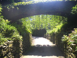 Minter Gardens man-made structure wood bridge and stone walls