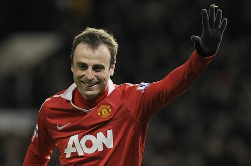 Dimitar Berbatov celebrates after scoring his fifth goal against Blackburn Rovers