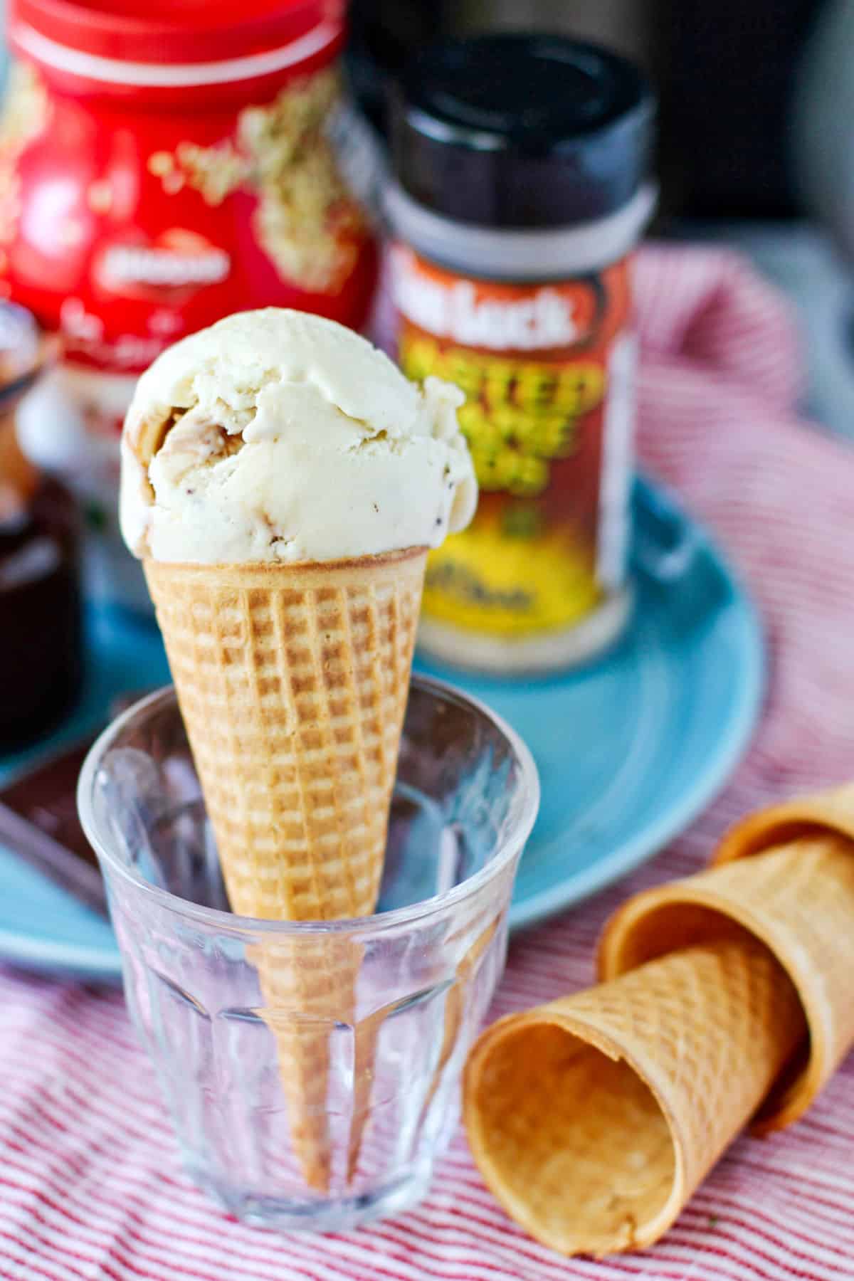 Tahini Chocolate Chunk No Churn Ice Cream in a cone in a glass.