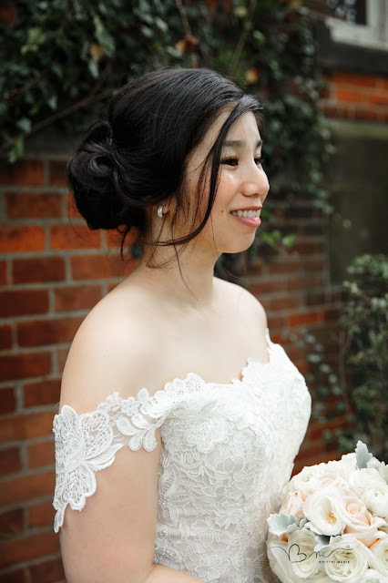 bridal portrait in front of ivory at Grosse Point Academy