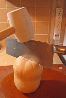 Cleaver and Rubber Mallet Starting to Cut Squash in Half