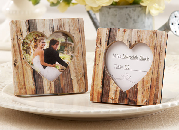 http://allstyleweddings.com/Wedding-Favors/Wedding-Favors-By-Theme/Outdoor-Wedding-Favors/Rustic-Romance-Faux-Wood-Heart-Place-Card-Holder-Photo-Frame