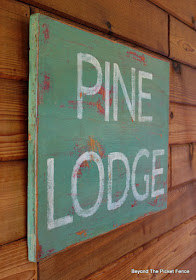 rustic pine lodge chippy sign