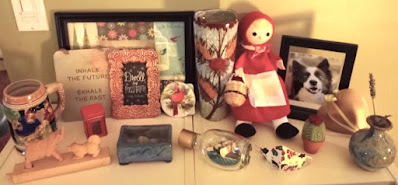 Jacqui's shelf of keepsakes from friends, family and travels