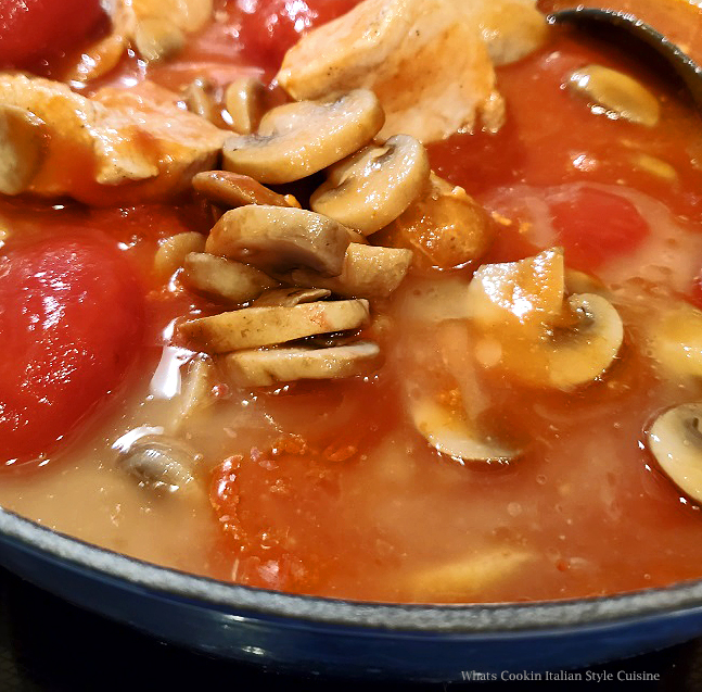 this is a delicious mushroom stew with whole tomatoes and pork call boscaiola sauce a dish made famous in Tuscany Italy