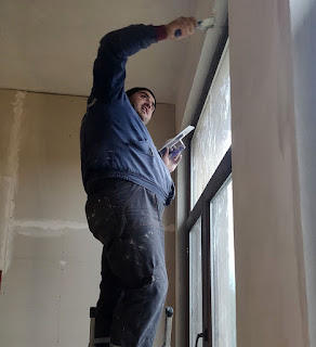 Plastering above the windows