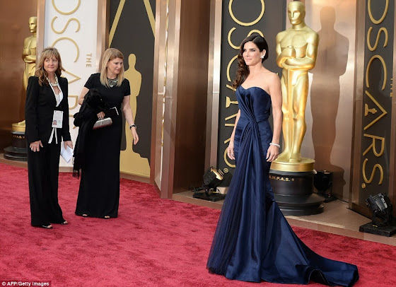 Sandra Bullock in a Navy McQueen dress at the Oscars 2014.