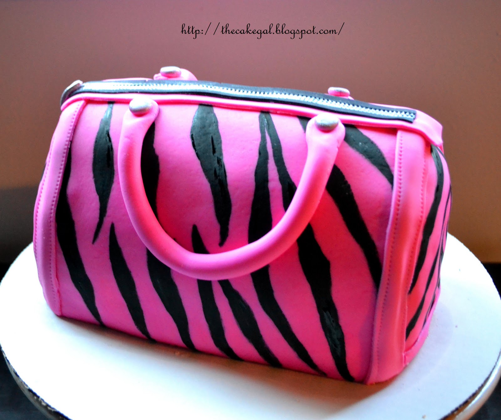 pink zebra-striped purse cake!!!