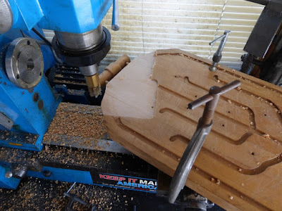 facing the top surface of the cutting board