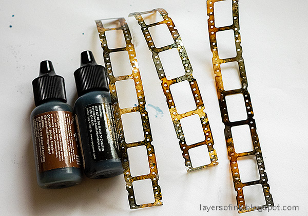 Layers of ink - Rose and Filmstrip Tag Tutorial by Anna-Karin Evaldsson. Ink filmstrip with alcohol ink.