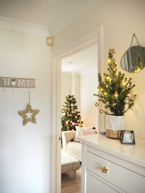 christmas home decor in gold and white featuring baubles and accessories from Dunelm, Laura Ashley, Sainsbury's and Hobbycraft.