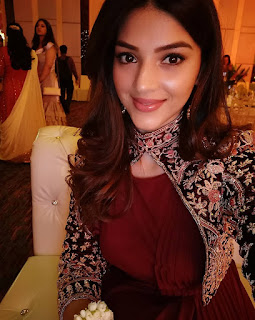 Mehreen Pirzada in Maroon with Cute and Lovely Smile
