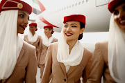 Eye on the Target. Uniform, plane, logo. I think I'm in love. (emirates images cabin crew april hi res tiff)