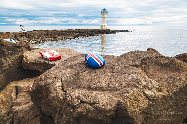 Iceland flag in Akranes near lighthouse