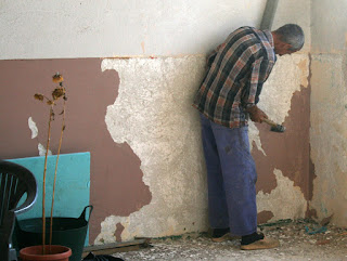 Sally starts chipping away at the paint