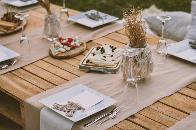 outdoor table laid:Photo by Ibrahim Boran on Unsplash