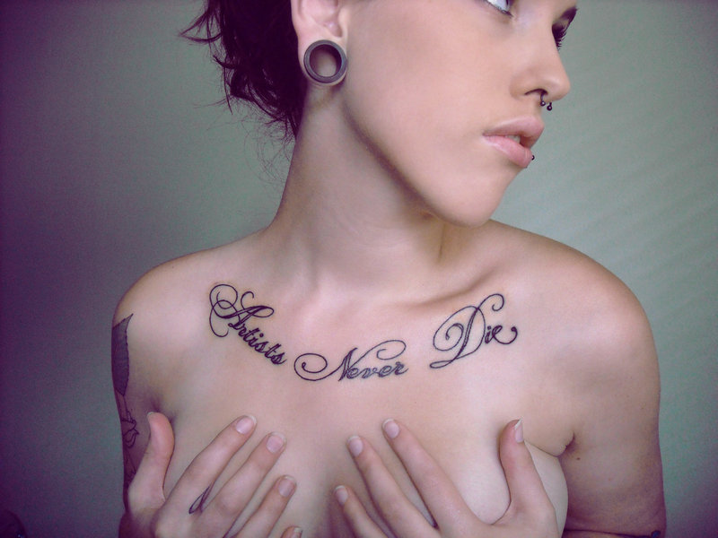 Angelina Jolie Yantra Tattoo On Her Back women tattoo design