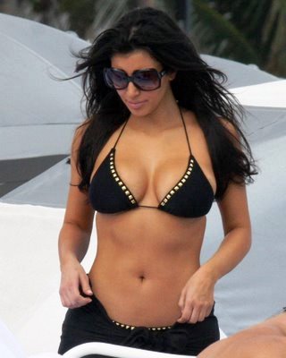 Kim Kardashian in Black Bikini at Swimming pool