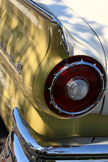 Big, round tail light mounted in yellow and white