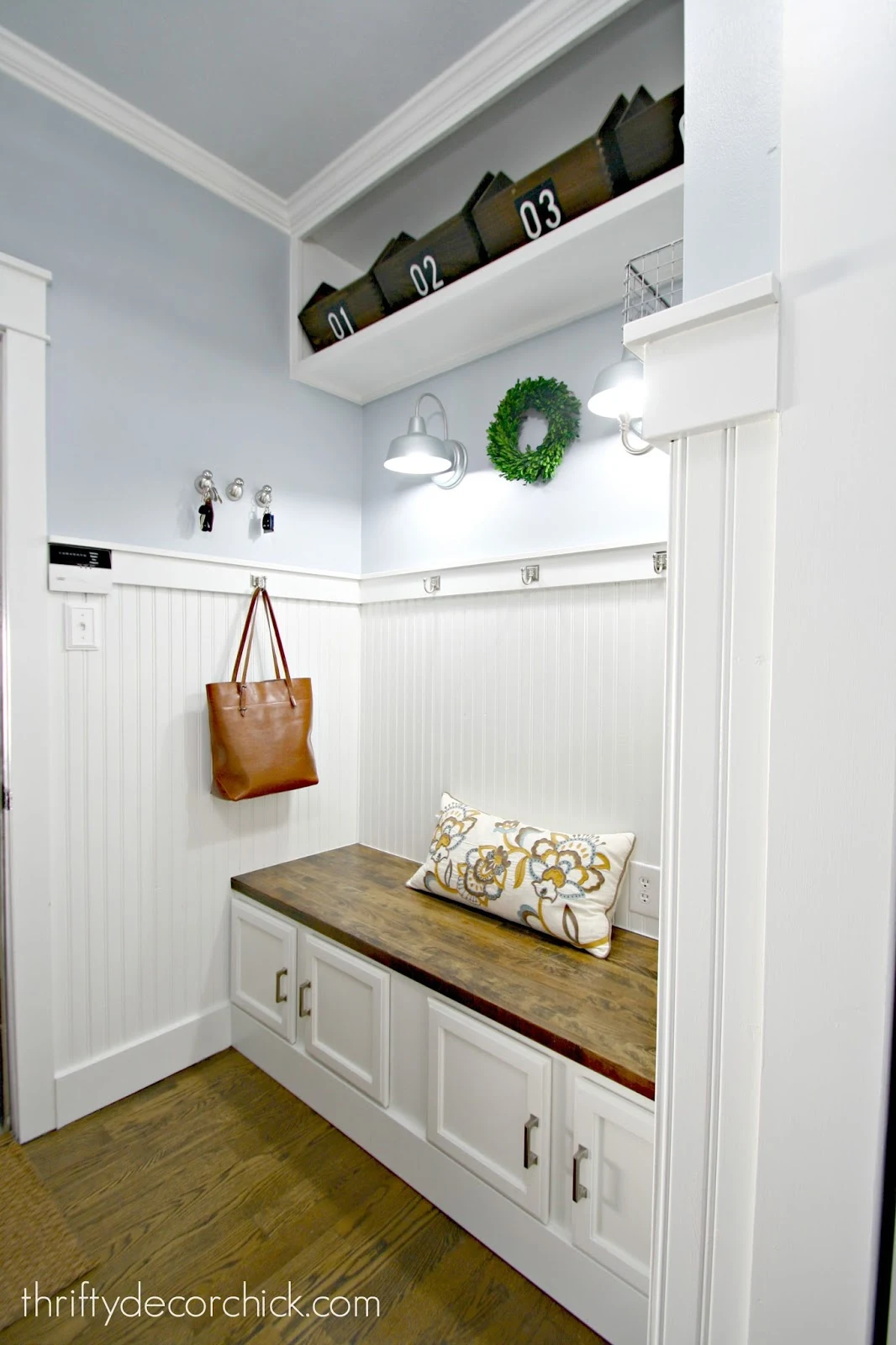 DIY mud room bench with sconces