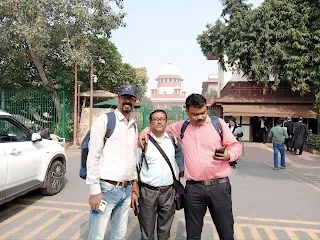 3 man in front of supreme court