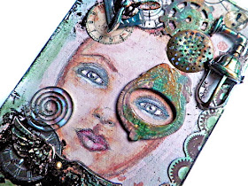 Scraps of Darkness scrapbook kits: Mixed media steampunk portrait canvas by Lisa Novogrodsk, created with our Sept. Tanya's Industrial Odyssey kit.