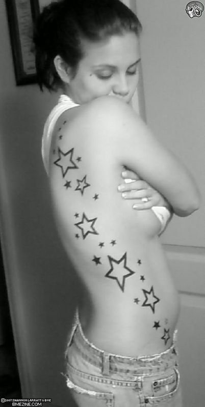 unique star tattoos for women. side tattoos for women. side