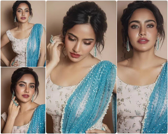 Neha Sharma Wavy Bun