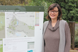 Villages of Mt Dandenong's Judy Ischia with the new map at Olinda.