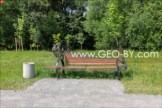 Minsk. Valley of fairy tales. Bench with a goldfish