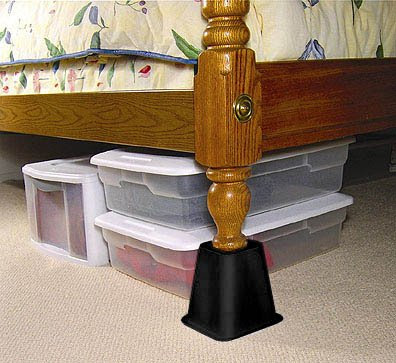 bed risers create storage space below bed