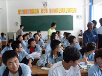 Karombe with students at the intermediate school