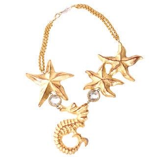 Vintage 1960's Yves Saint Laurent gold starfish and seahorse necklace.