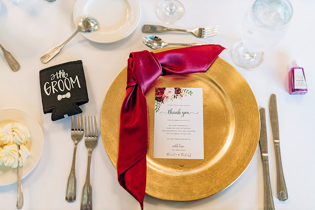 gold and burgundy reception settings