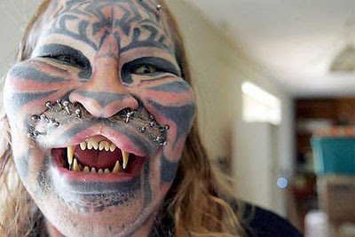 body piercing and tattoo tiger style