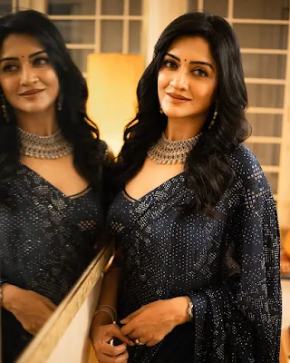 Actress Vimala raman stylish looks in blue saree photoshoot
