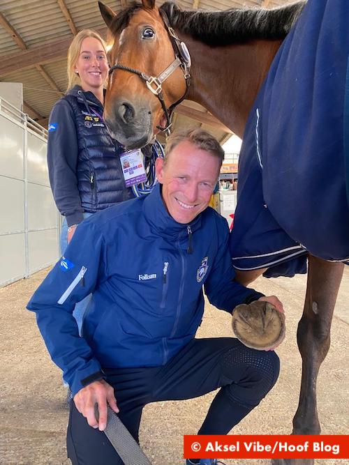 Peder Fredricson, Olympic and World Champion holds a rasp to trim his horse's hoof