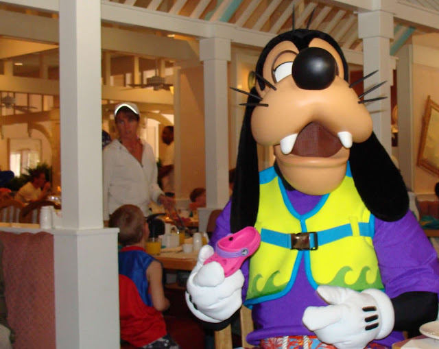 Goofy Holding a Pink Croc Cape May Cafe Walt Disney World