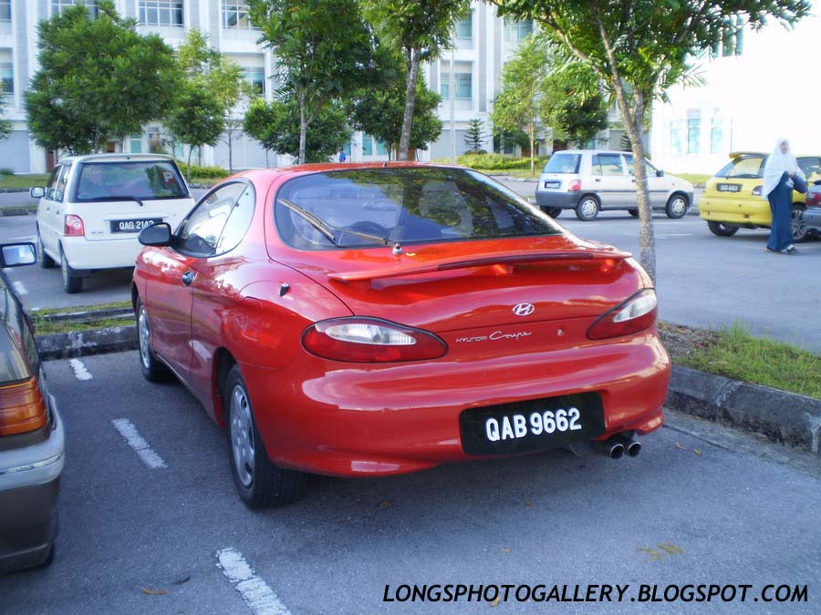 Stock Hyundai Coupe in Red Color