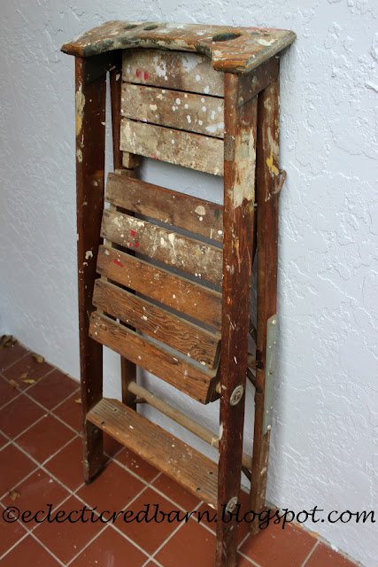 Eclectic Red Barn: Old ladder with platform step